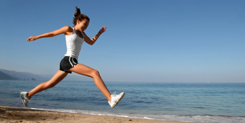 woman running on beach, northstar natural